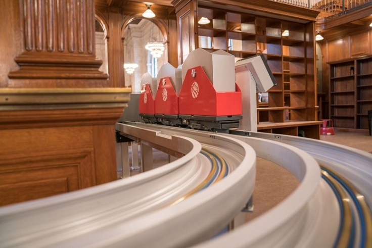 New York Public Library installs high-tech, wall-climbing book-train